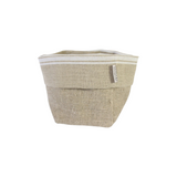 Calimia Home beige Belgian linen fabric storage basket with a white striped rim and a small branded fabric tag.