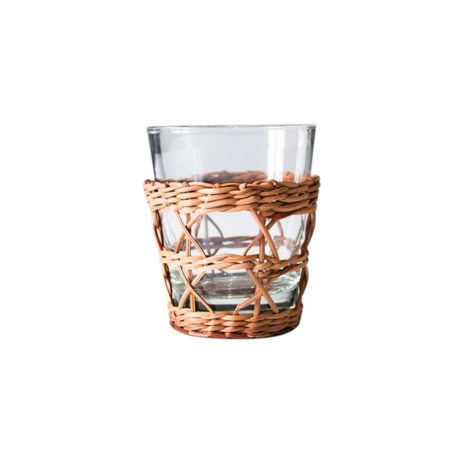 Calimia Home clear glass tumbler featuring a removable handwoven natural seagrass cage wrap for a coastal aesthetic.