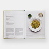 Calimia Home The Regional Italian Cookbook book open to a spread showing a trofie with pesto recipe.