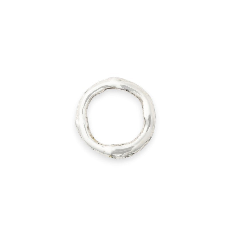 Calimia Home branch-inspired silver-toned napkin ring with a textured, organic sculptural design.