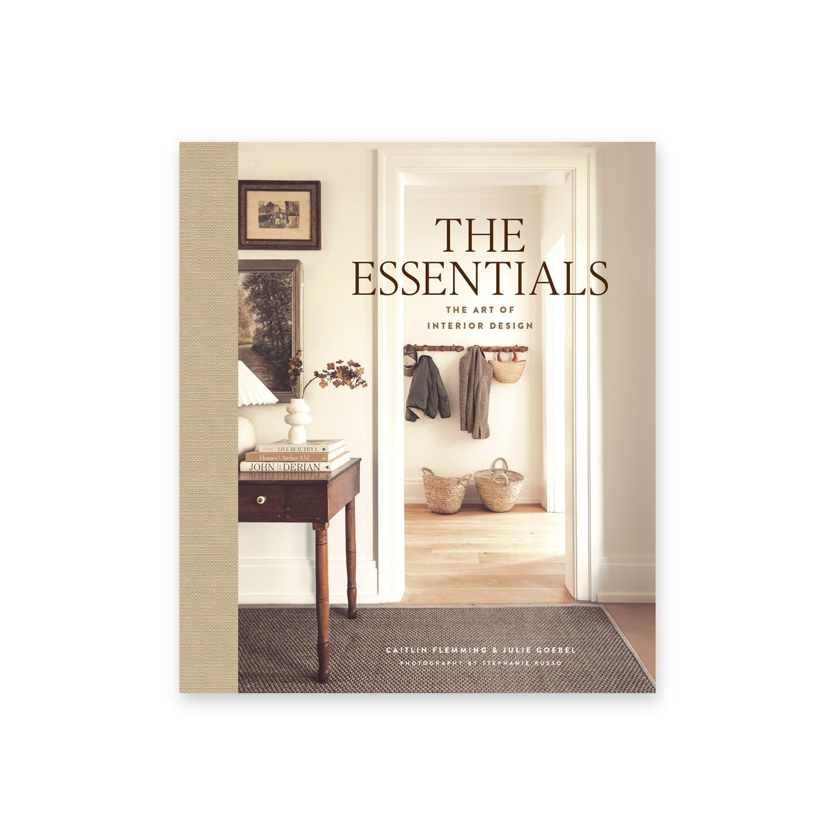 Calimia Home The Essentials: The Art of Interior Design book by Caitlin Flemming and Julie Goebel, cover showing a sunlit entry hall.