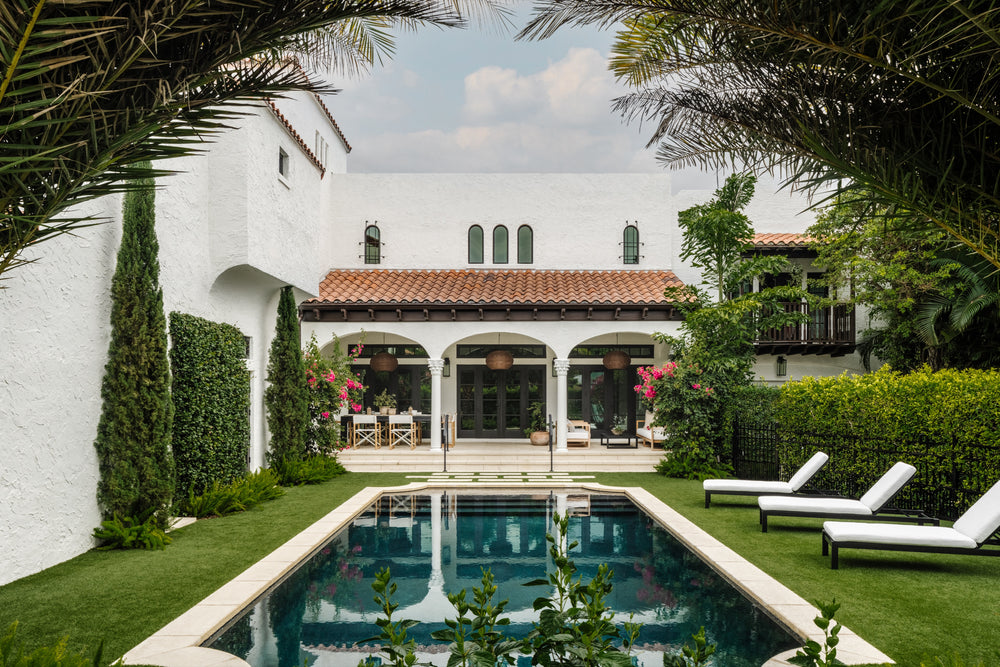 Pool and arched loggia of the Mediterranean-style Villa Belmonte residence in West Palm Beach