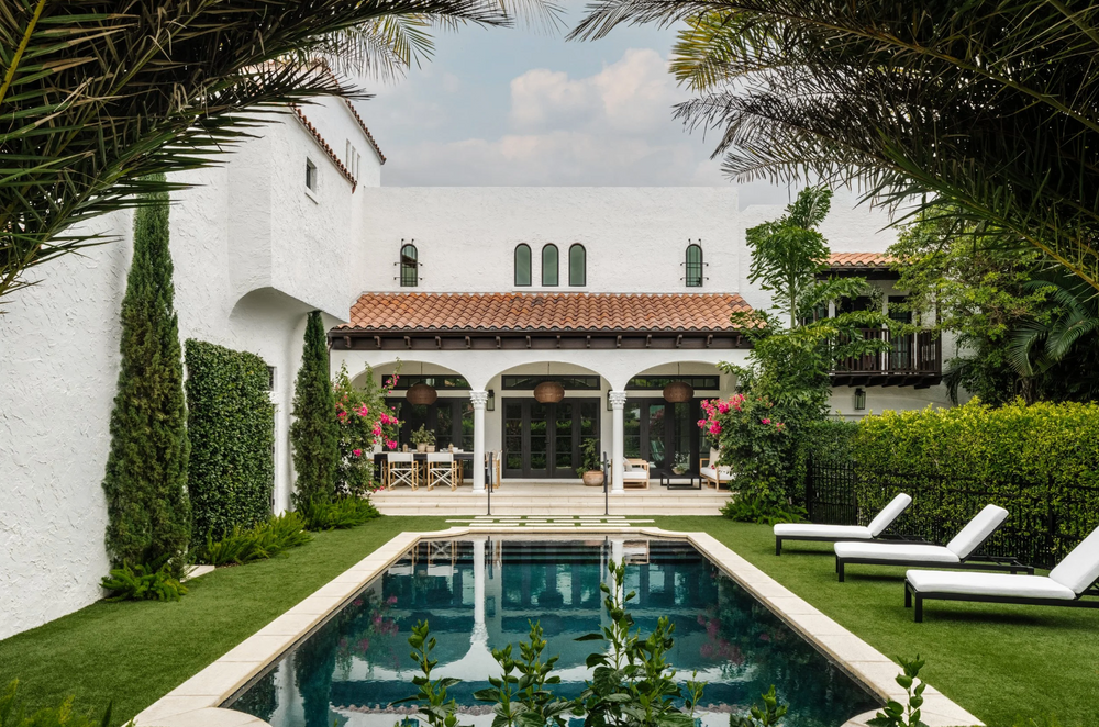 Pool and arched loggia of the Mediterranean-style Villa Belmonte residence in West Palm Beach