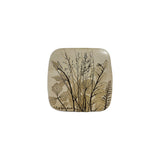 Second view of the meadow grasses ceramic wall tile showing the iron wash pooling in the pressed impressions