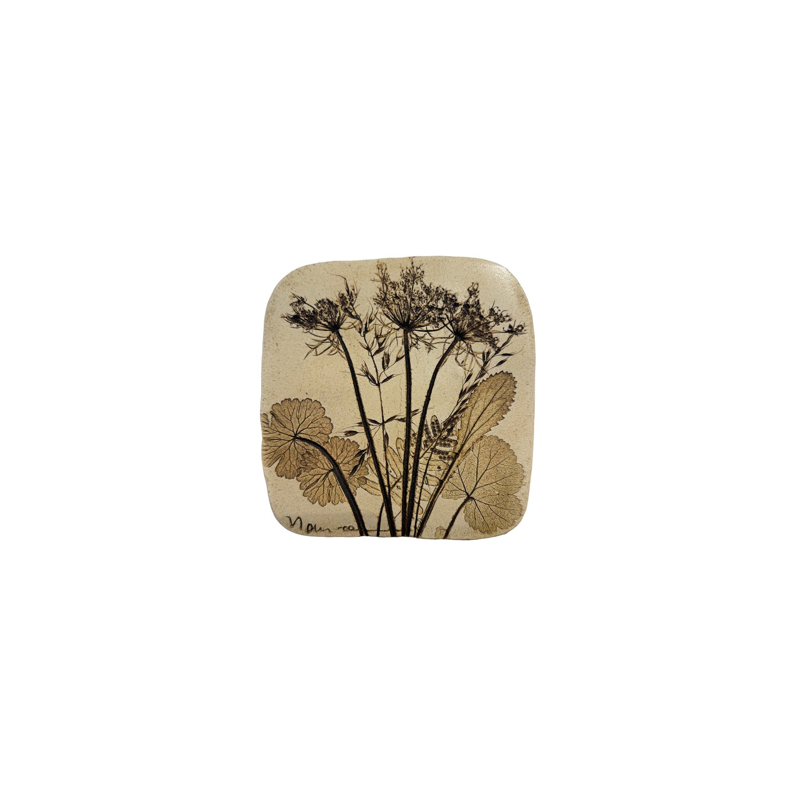Vintage ceramic botanical wall tile with Queen Anne's lace and scalloped geranium leaves pressed into speckled cream stoneware, signed by the maker
