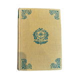 Calimia Home vintage Fortaellinger book by Herman Bang with yellow cloth cover and green floral corner detailing