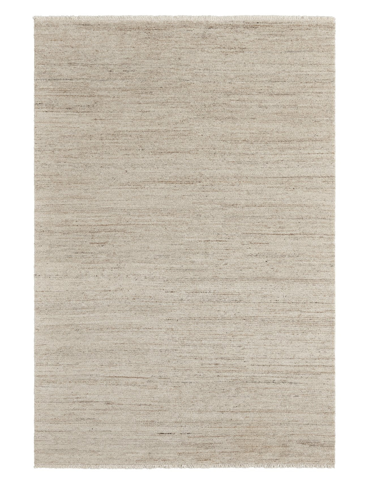 Armadillo Camino Rug in Sawdust, a second view of the cut pile undyed wool rug in a styled interior