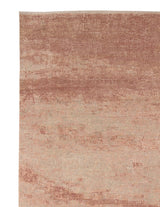 Armadillo Alma Rug in Urn, corner close-up of the wool and silk pile and edge