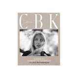 Book cover with 'CBK' and a photo of a woman on a light gray background