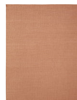 Armadillo Aerie Rug in Bellini, corner close-up of the linen, wool, and jute pile and edge