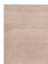 Armadillo Thatch Rug in Pink Salt, corner close-up of the wool pile and edge