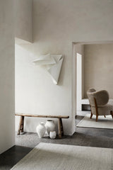 Armadillo Aspen Rug in Fog, handwoven soumak wool rug shown in a room setting