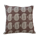 Filling Spaces Cefalu Coco pillow with a brown and neutral hand-block-printed paisley motif on textured fabric.