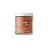 Calicutts Chipotle and Honey spice blend in a clear glass jar with a silver lid, featuring a rustic label.