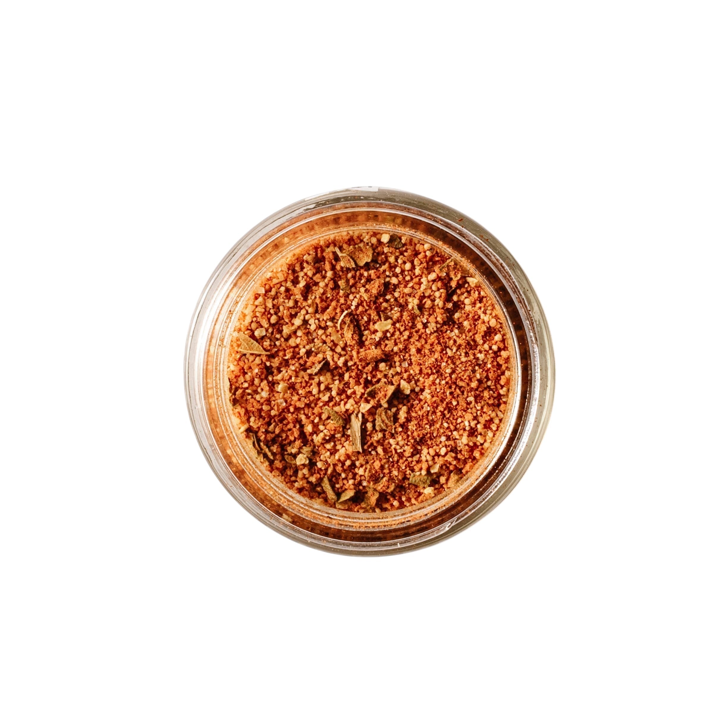 Calicutts Chipotle & Honey spice blend in a glass jar, featuring a vibrant orange-red seasoning mix.