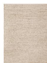 Armadillo Cirrus Rug in Wafer, corner close-up of the wool pile and edge