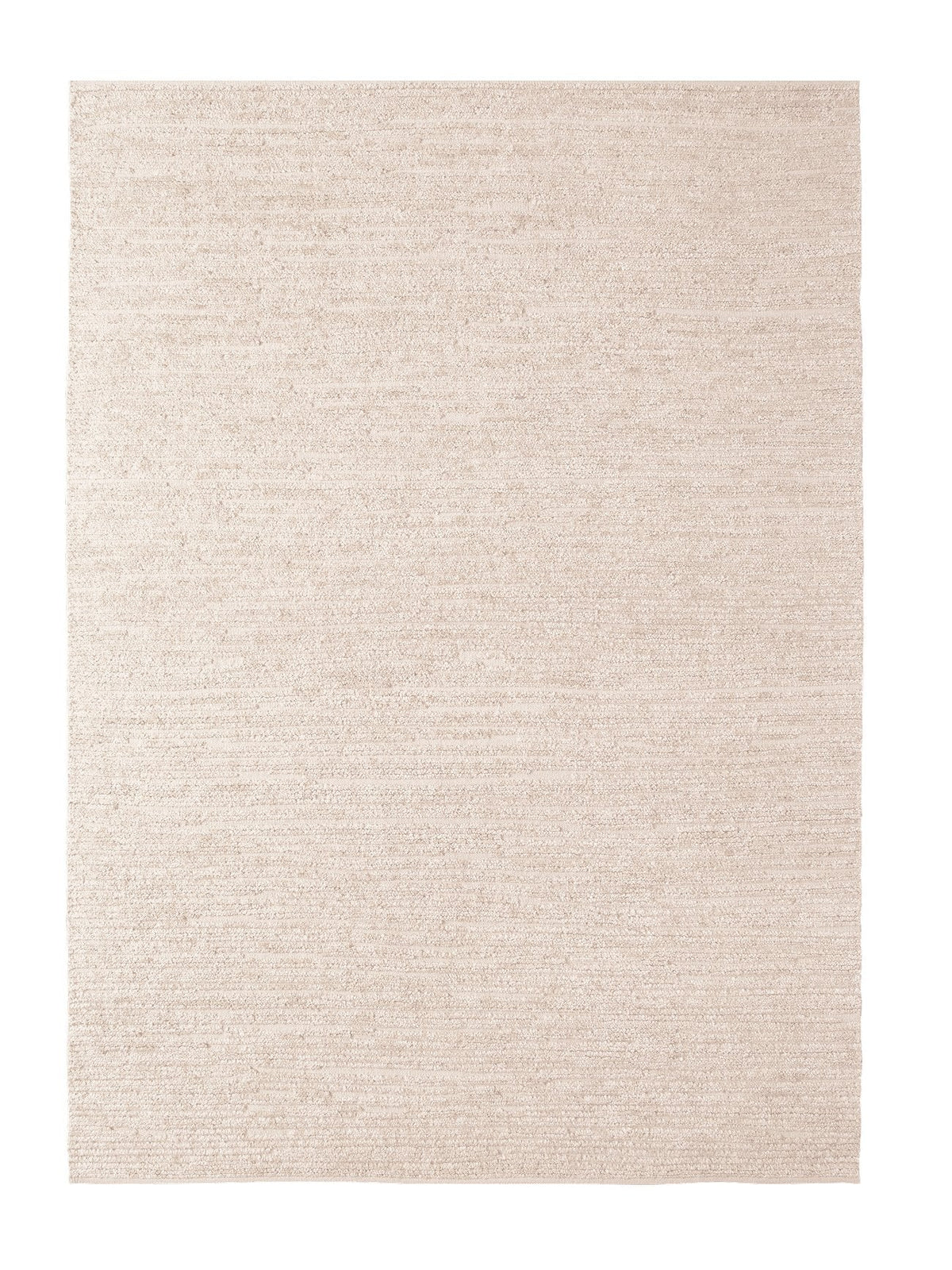 Armadillo Cirrus Rug in Salt, a second view of the hand-knotted wool rug in a styled interior