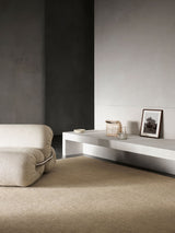 Armadillo Corsica Rug in Paperbark, handwoven wool and linen rug shown in a room setting
