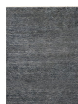 Armadillo Corsica Rug in Indigo, corner close-up of the wool and linen pile and edge