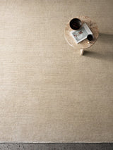 Armadillo Corsica Rug in Paperbark, a second view of the handwoven wool and linen rug in a styled interior