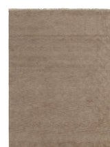 Armadillo Corsica Rug in Flannel, corner close-up of the wool and linen pile and edge