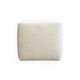 Calimia Home Cube Ottoman upholstered in nubby oatmeal Belgian linen with a minimalist square silhouette.