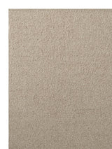 Armadillo Pebble Rug in Whippet, corner close-up of the hand-spun new zealand wool pile and edge