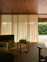 Armadillo Arroyo Rug in Thorn, handwoven felted wool rug shown in a room setting