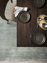 Armadillo Agra Rug in Moonstone, overhead view of the hand-knotted wool weave and edge finish