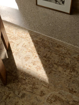 Armadillo Allegra Rug in Cinnamon, overhead view of the hand-knotted wool weave and edge finish