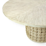 Calimia Home Damien dining table with a round white-washed hardwood top and a base wrapped in woven natural abaca rope.