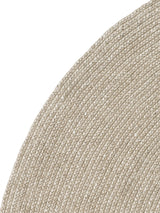 Armadillo Braid Rug in Mushroom, corner close-up of the wool and viscose blend pile and edge