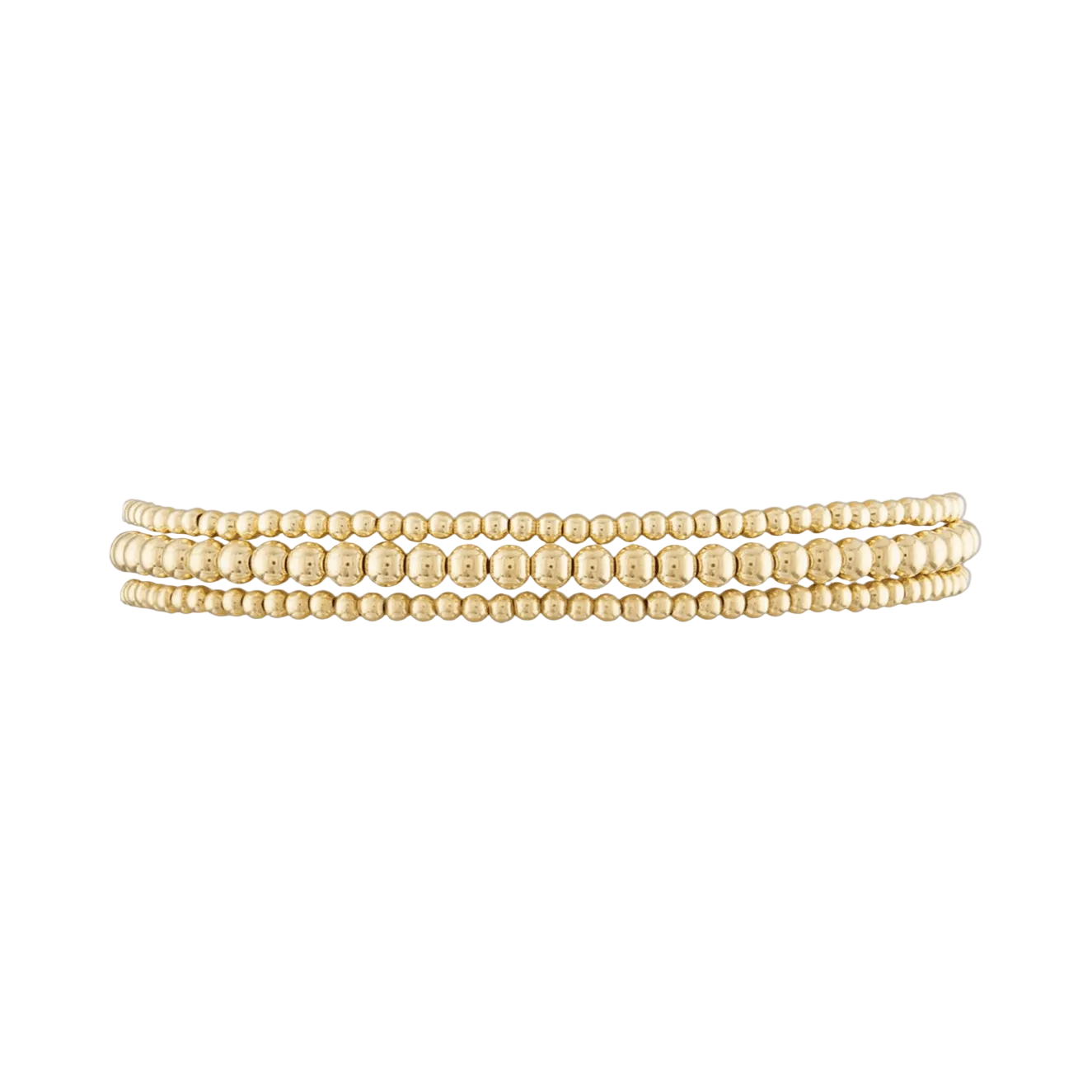 Close-up of Delicate Stack bracelet in yellow gold showing delicate spheres