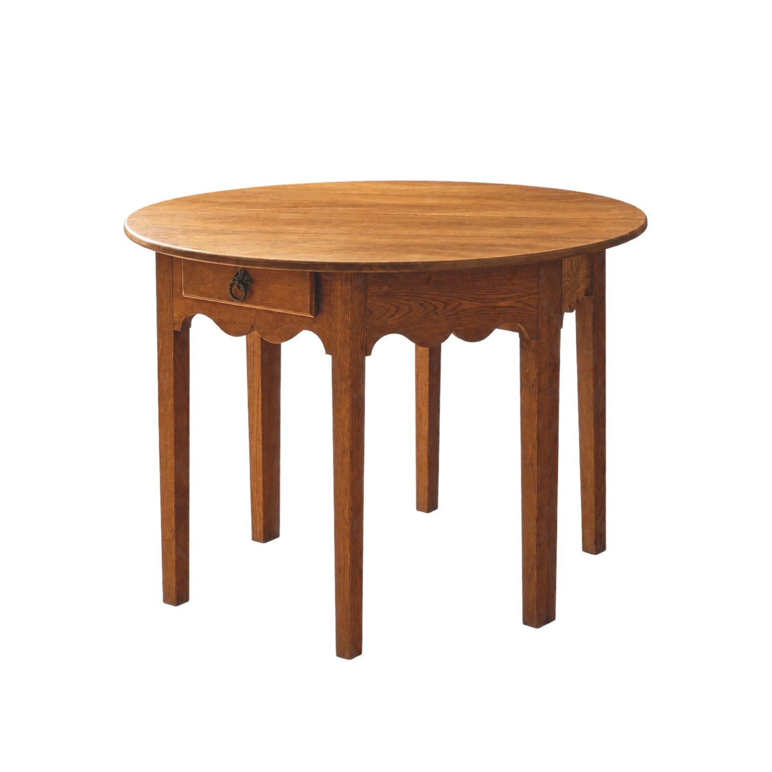 Calimia Home Demi Vintage Table in warm wood with a round top, scalloped apron, and a single drawer with ring pull.