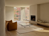 Armadillo Aspen Rug in Sandstorm, handwoven soumak wool rug shown in a room setting