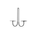 Black metal candle holder on a white background