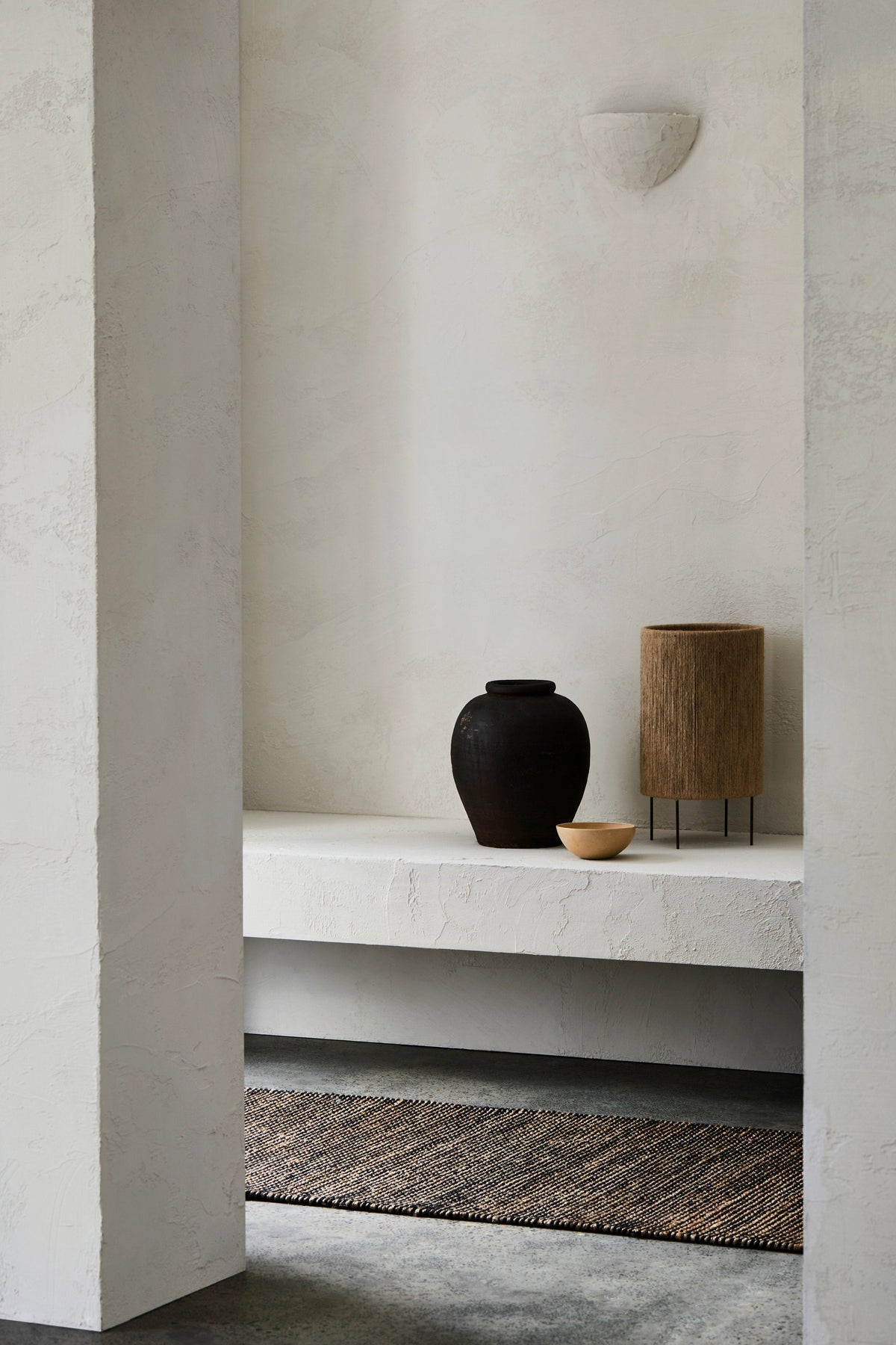 Drift Runner by Armadillo, handwoven jute and wool rug, styled in a room at Calimia Home
