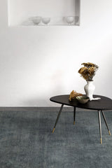 Armadillo Agra Rug in Marlin, a second view of the hand-knotted wool rug in a styled interior
