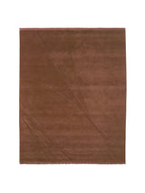Armadillo Marea Rug in Russet, overhead view of the hand-knotted and hand-carved wool weave and edge finish