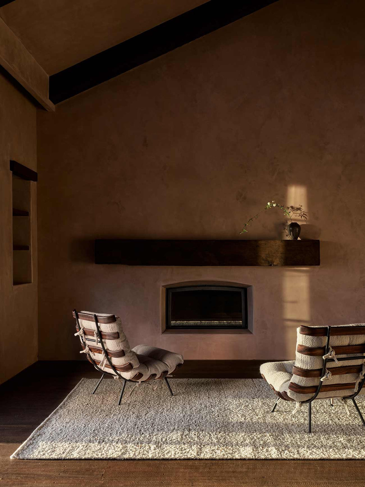 Tempest Rug by Armadillo, handcrafted undyed new zealand wool rug, styled in a room at Calimia Home