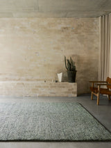 Armadillo Meadow Rug in Seagrass, hand-knotted wool rug shown in a room setting