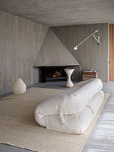 Armadillo Cable Rug in Calico, overhead view of the handwoven soumak wool weave and edge finish