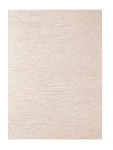 Armadillo Cirrus Rug in Salt, a second view of the hand-knotted wool rug in a styled interior