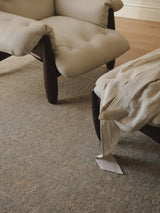 Armadillo Adagio Rug in Neptune, a second view of the hand-knotted wool rug in a styled interior