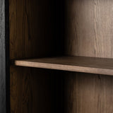 Calimia Home ebony oak cabinet interior featuring a natural tan oak wood shelf and grain detail.