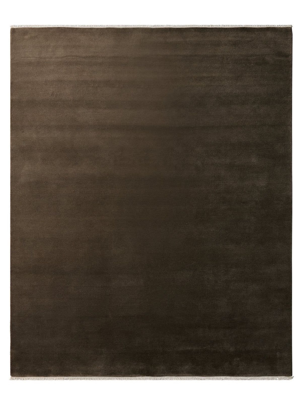 Armadillo Eden Rug in Chestnut, a second view of the hand-knotted wool rug in a styled interior