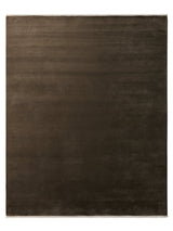 Armadillo Eden Rug in Chestnut, a second view of the hand-knotted wool rug in a styled interior