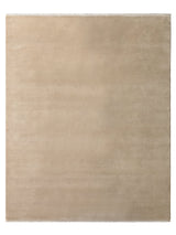 Armadillo Eden Rug in Nougat, overhead view of the hand-knotted wool weave and edge finish