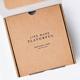 Calicutts Essentials Gift Set in a brown cardboard box with Life Made Flavorful printed on the inside lid.