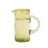 Etched Thistle Glass Pitcher in olive green on beige background